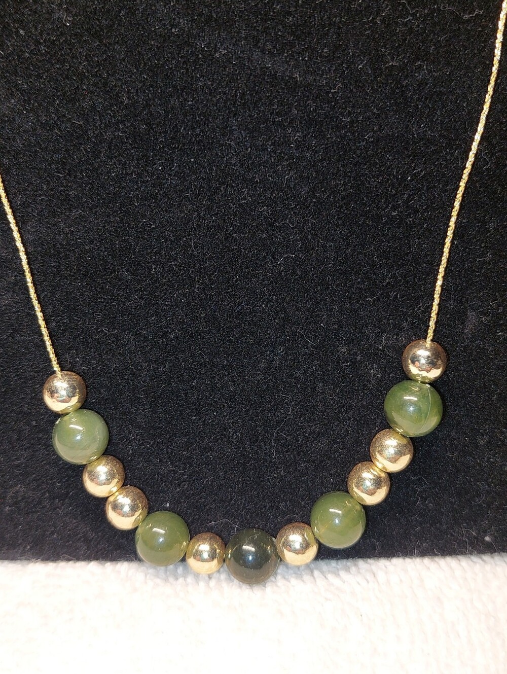 Gold Tone Necklace with Green Beads
